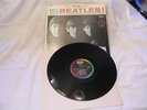 The Beatles Album Meet The Beatles on Capitol Records ST-8 2047.