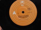 SHAKIN' STEVENS - 45 VINYL RECORD - TREAT HER RIGHT