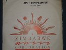 STATUS QUO  , ULTRA  RARE ZIMBABWE PRESSING , AIN'T COMPLAINING , GENERIC SLEEVE