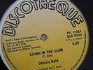 DENNIS REID - LIVING IN THE SLUM (KILLER ROOTS) LISTEN ?