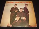 Introducing the Beatles LP  VJ 1062 black label with silver print shadow cover