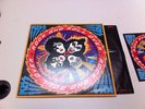 KISS ROCK AND ROLL OVER TEARDROP VARIANT COVER WITH STICKER