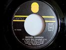 MICHEL SARDOU / LA VALLÉE DES POUPÉES / LE TEMPS DES COLONIES 45T COMME NEUF 