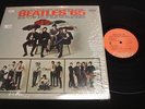 The  Beatles '65 LP Near Mint in shrink Capitol ST 2228 1970s Orange Label