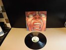 in the court of the crimson king lp near mint with ripped cd of lp