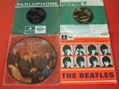 BEATLES COLLECTION OF RECORDS, ONE PICTURE DISC, ONE E.P. AND TWO SINGLES