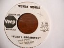 TRUMAN THOMAS 