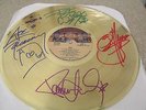 KISS SIGNED GOLD LP   -  DRESSED TO KILL  ALBUM RECORD - PAUL,GENE, ACE & PETER