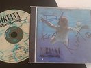 Nirvana signed CD. Nirvana Autograph. Dave, Kurt, Krist. Not Vinyl, 45, 7