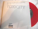 SYSTEM OF A DOWN   TOXICITY ** 2002 COLUMBIA 45. RED VINYL. MINT