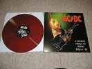 AC/DC - A LESSON ABOUT TO ROCK  red marble Vinyl