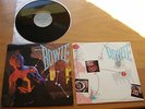 DAVID BOWIE-LP-LETS DANCE-COMPLETE AND WITH INSERT IN EXC CONDITION-VINYL N/MINT