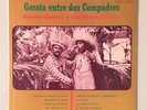 GERMAN ROSARIO Y LUIS MORALES RAMOS GARATA ENTRE DOS COMPADRES ON LA FLOR