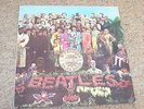 THE BEATLES , SGT PEPPERS LONELY HEARTS CLUB BAND . LISTEN TO BOTH SIDES .