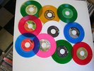 SET OF 10 COLORED VINYL 45 RPM RECORDS
