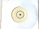 U2-A CELEBRATION/TRASH-RARE ORIGINAL UK WHITE PUNCHED OUT LABEL 7