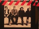 U2 HOW TO DISMANTLE AN ATOMIC BOMB LP W/BOOK COLOR VINYL