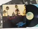 The Eagles - Hotel California - Vinyl LP + Poster 6E-103 Near Mint (NM)