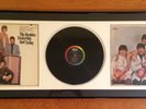BEATLES 2ND STATE PASTE OVER, 3RD STATE BUTCHER ALBUMS, AND RECORDS IN ONE FRAME