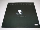 SHINY TOY GUNS   LE DISKO   VINYL IS MINT AND UNPLAYED   FIRST AMERICAN PRESSING