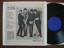 The Beatles LP Live in anytown EX + vinyl plain white cover