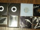 Eight (8) Different U2 7