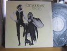 - has a FLEETWOOD MAC RUMOURS RECORD LP VINYL  w/INNER