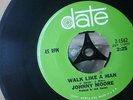 Johnny Moore . Walk like a man .