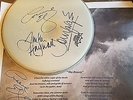 autographed drum skin and poster from The Moody Blues Band