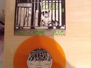 U.K. SUBS - C.I.D. - ORANGE VINYL