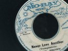 1477 BUSTY BROWN-NEVER LOVE ANOTHER-MO-BAY-  REGGAE 45 7