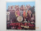 A twin track mono tape by THE BEATLES titled SGT PEPPERS LONELY HEART CLUB BAND