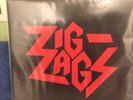 Zig Zags Running Out Of Red Colored Vinyl Red/Black Splatter Garage Psych