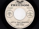 ROCKABILLY-LARRY O'KEEFE-FREEDOM 44020-AIN'T-A THAT SOMETHIN'/LOVE'S DREAM