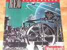 REO SPEEDWAGON WHEELS ARE TURNIN' SEALED LP W/ ROUND HYPE STICKER