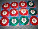 45 RPM  RARE ELTON JOHN GREEN/RED COLLECTABLES Complete Set Of 24 Records