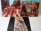 D) Vinyl: The Beatles Abbey Road 383 McCartney 3363 Apple Sgt. Pepper’s 2653