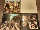 Four The Beatles vinyl albums Sgt Pepper White album