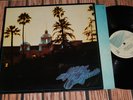 THE EAGLES   HOTEL CALIFORNIA LP   NEAR MINT ORIGINAL PRESS WITH POSTER