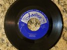 CLARENCE CURVAN JAMAICA SKA/SHE LOVES ME RARE HARD TO FIND CALYPSO JOEVAN 45RPM