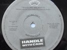 THE TRAVELING WILBURYS Handle with care Ex to NM- CANADA '88 PROMO 45 BOB DYLAN