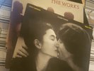 Mixed bag of vinyl records. John Lennon, Michael Jackson, Queen,