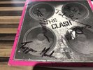 the CLASH signed by all of the band COMPLETE CONTROL