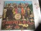 The Beatles Sgt Peppers Lonely Hearts Club Band vinyl in good condition, 