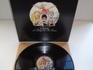 QUEEN-A DAY AT THE RACES...SUPERB 1ST UK PRESSING NEAR MINT VINYL LP RECORD 1976