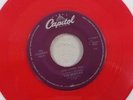 COLORED RED THE BEATLES SHE LOVES YOU VINYL 45 RECORD RE14