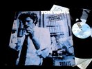 TOM WAITS/BOUNCED CHECKS/ASYLUM/GERMAN PRESS