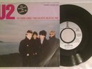 U2  40  (How Long) Two Hearts Beat As One 7