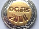Oasis Promo £2 Coin - Standing On the shoulder Of giants Noel / Liam Gallagher