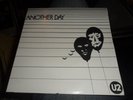 U2.ANOTHER DAY 7'' VINYL RED LABEL